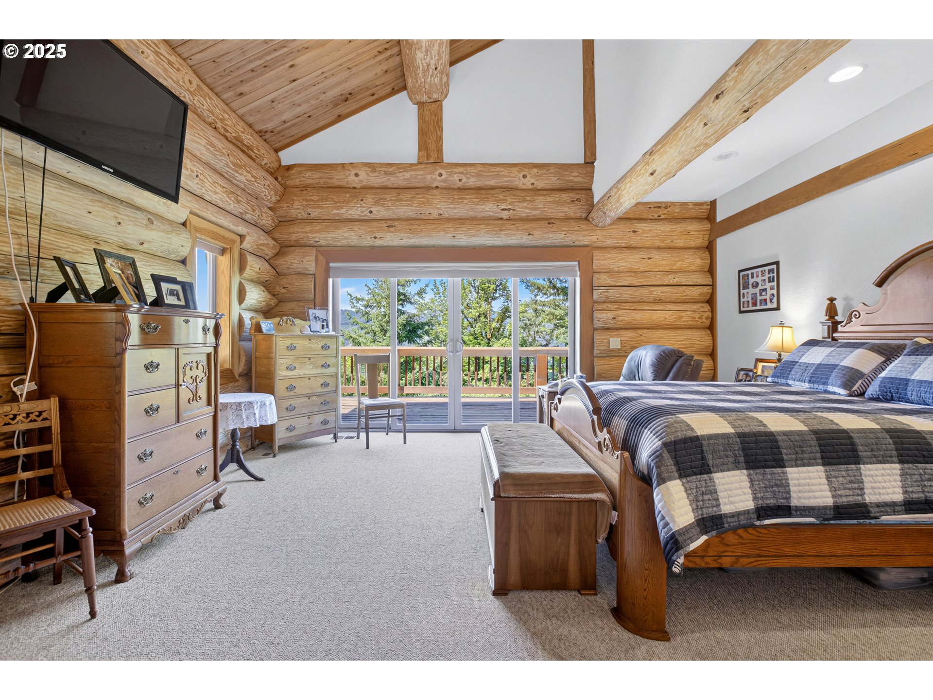 89112 Sky High Drive Springfield, OR 97478 - Photo 16 of 47 a bedroom with furniture and a window