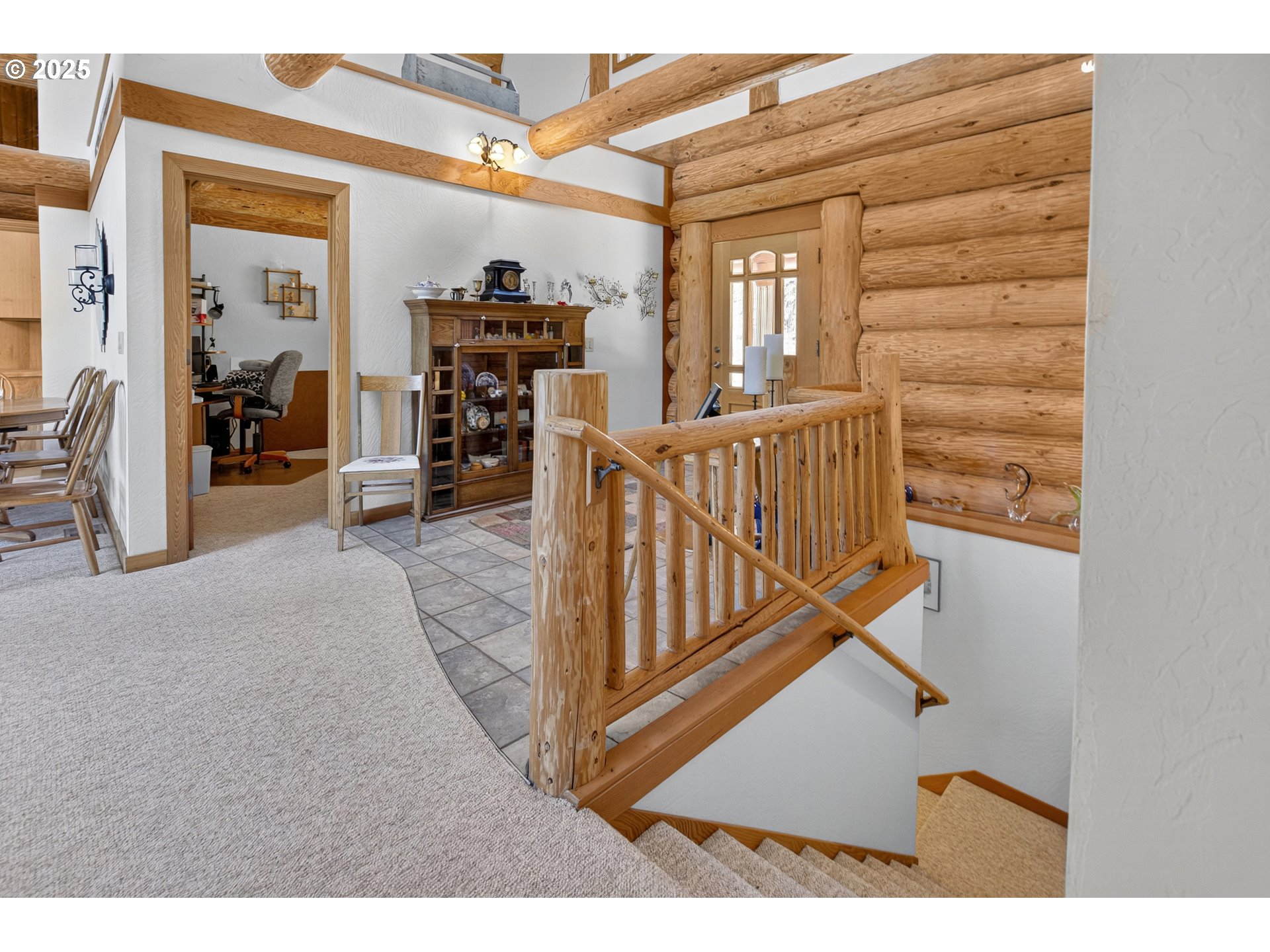 89112 Sky High Drive Springfield, OR 97478 - Photo 24 of 47 a view of a livingroom with furniture and staircase