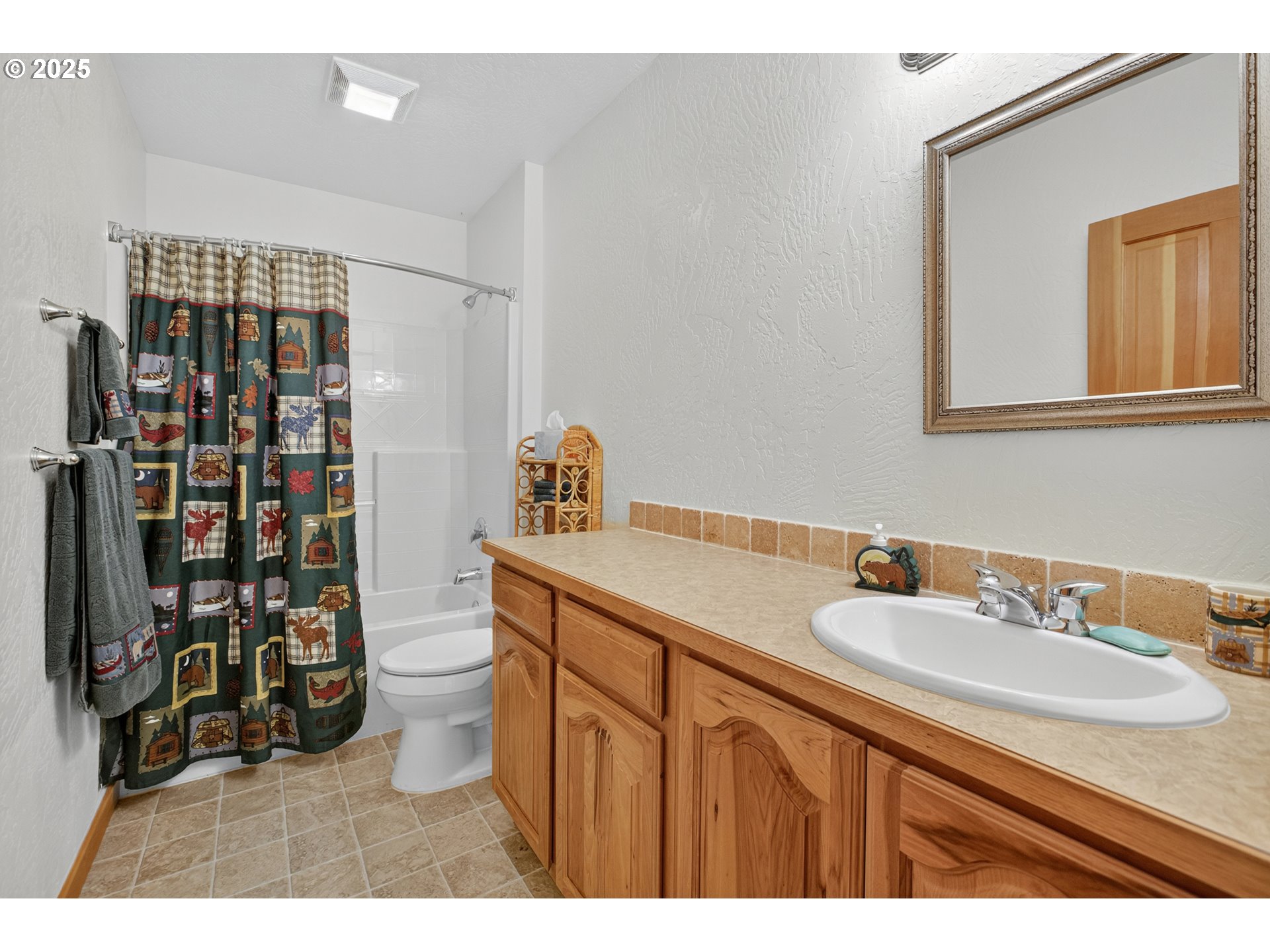 89112 Sky High Drive Springfield, OR 97478 - Photo 32 of 47 a bathroom with a sink double vanity and a shower