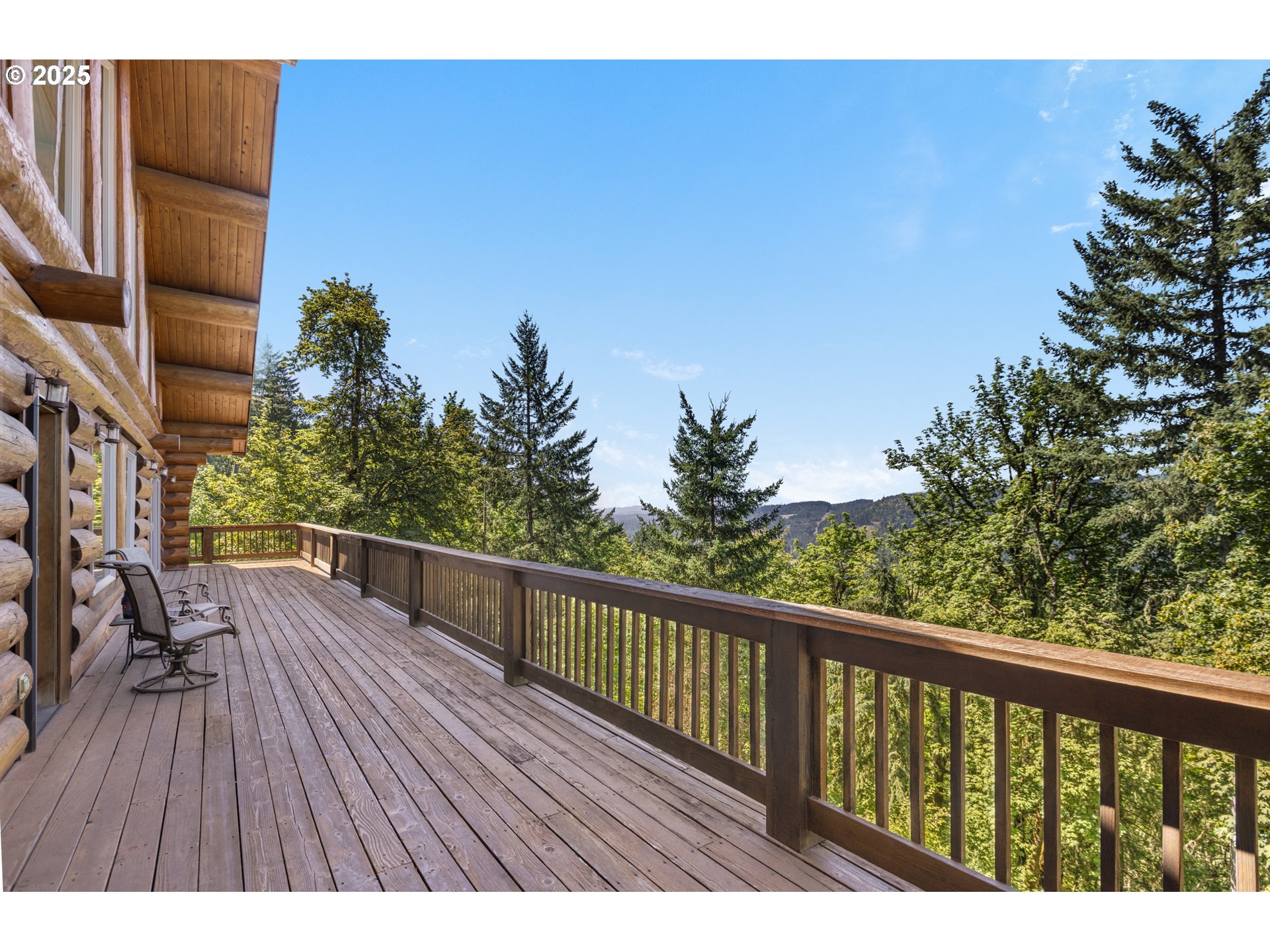 89112 Sky High Drive Springfield, OR 97478 - Photo 37 of 47 a view of balcony with wooden floor and fence