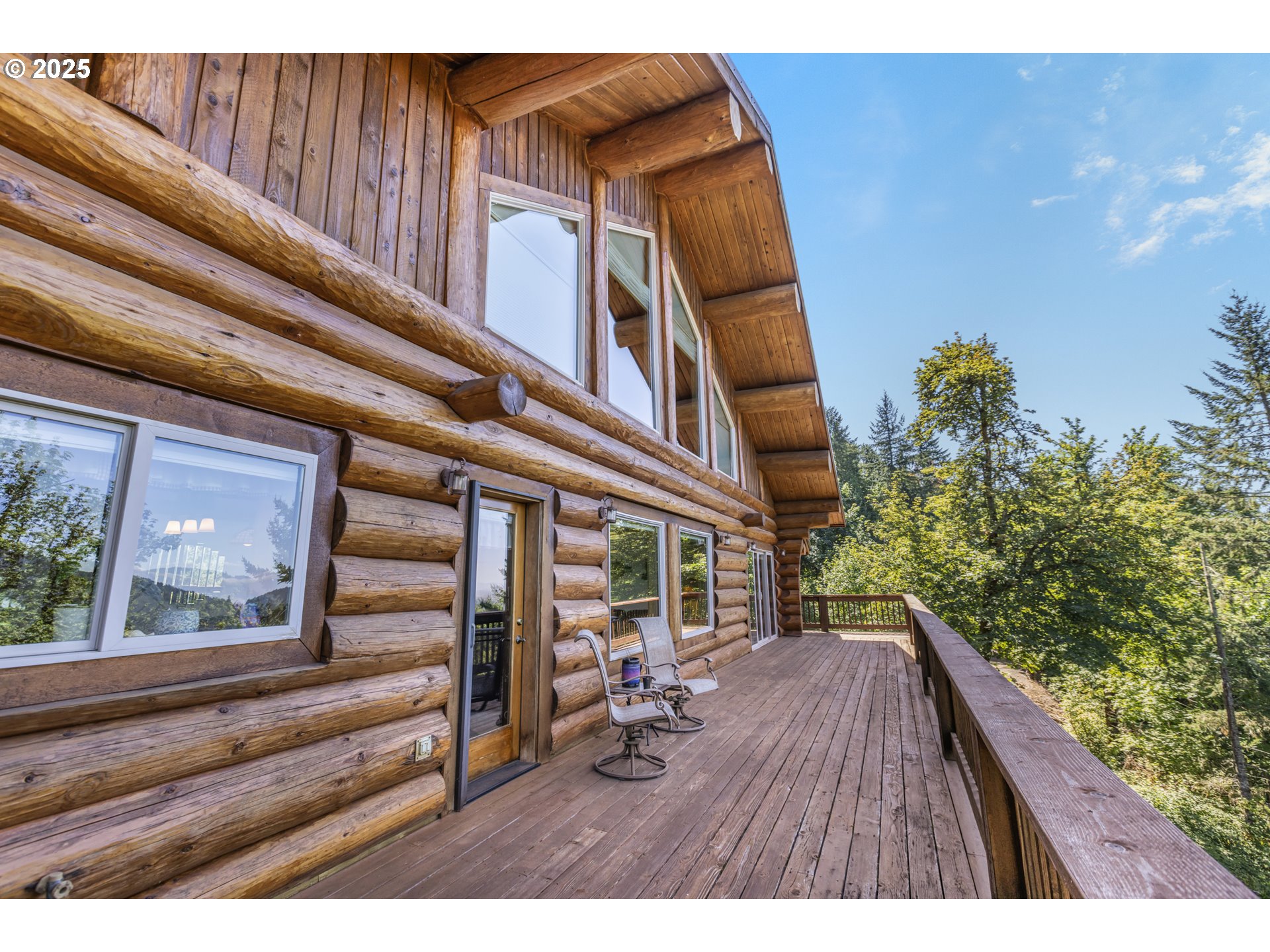 89112 Sky High Drive Springfield, OR 97478 - Photo 39 of 47 swimming view and patio with wooden floor