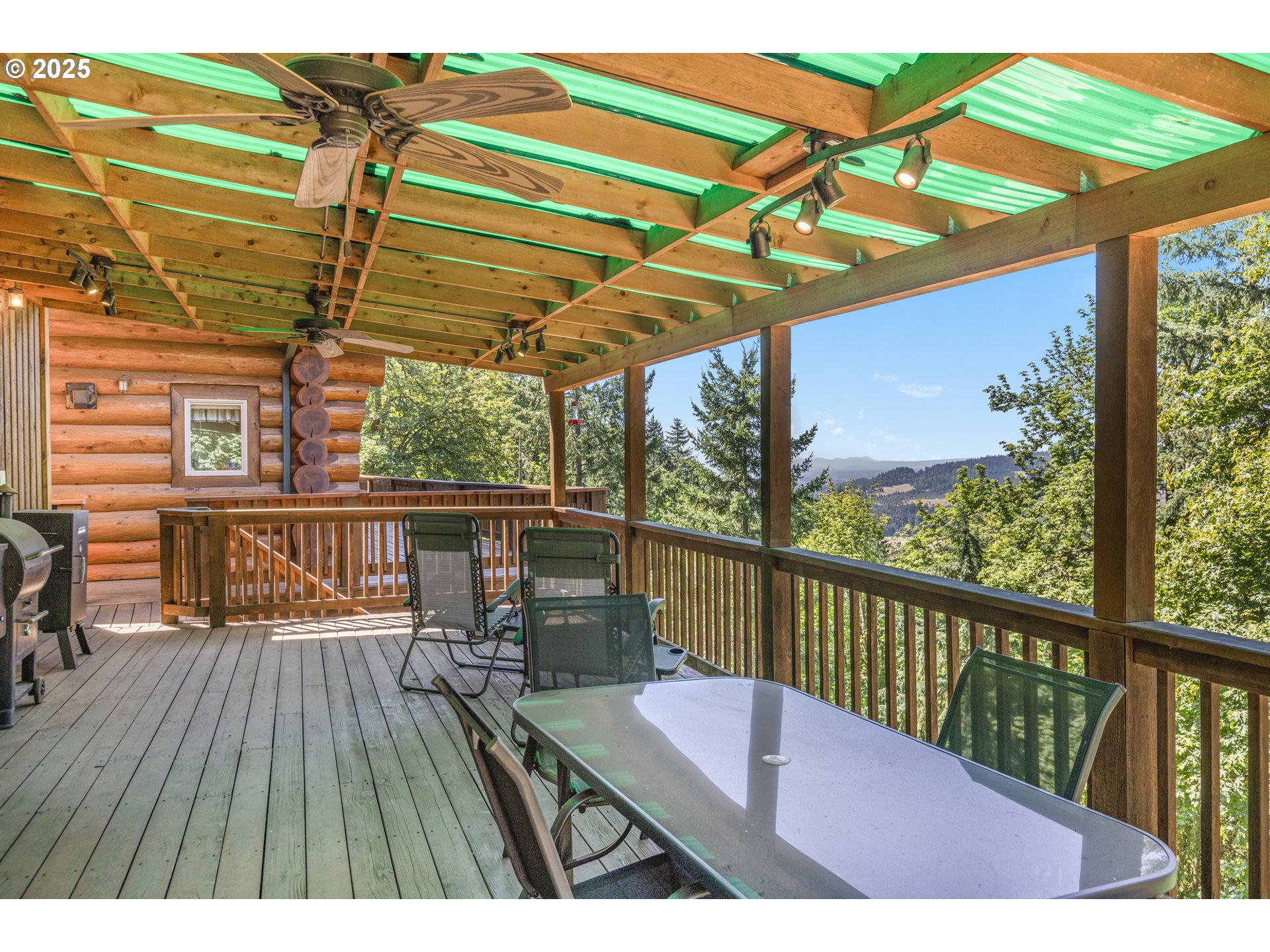 89112 Sky High Drive Springfield, OR 97478 - Photo 40 of 47 a view of a balcony with chairs