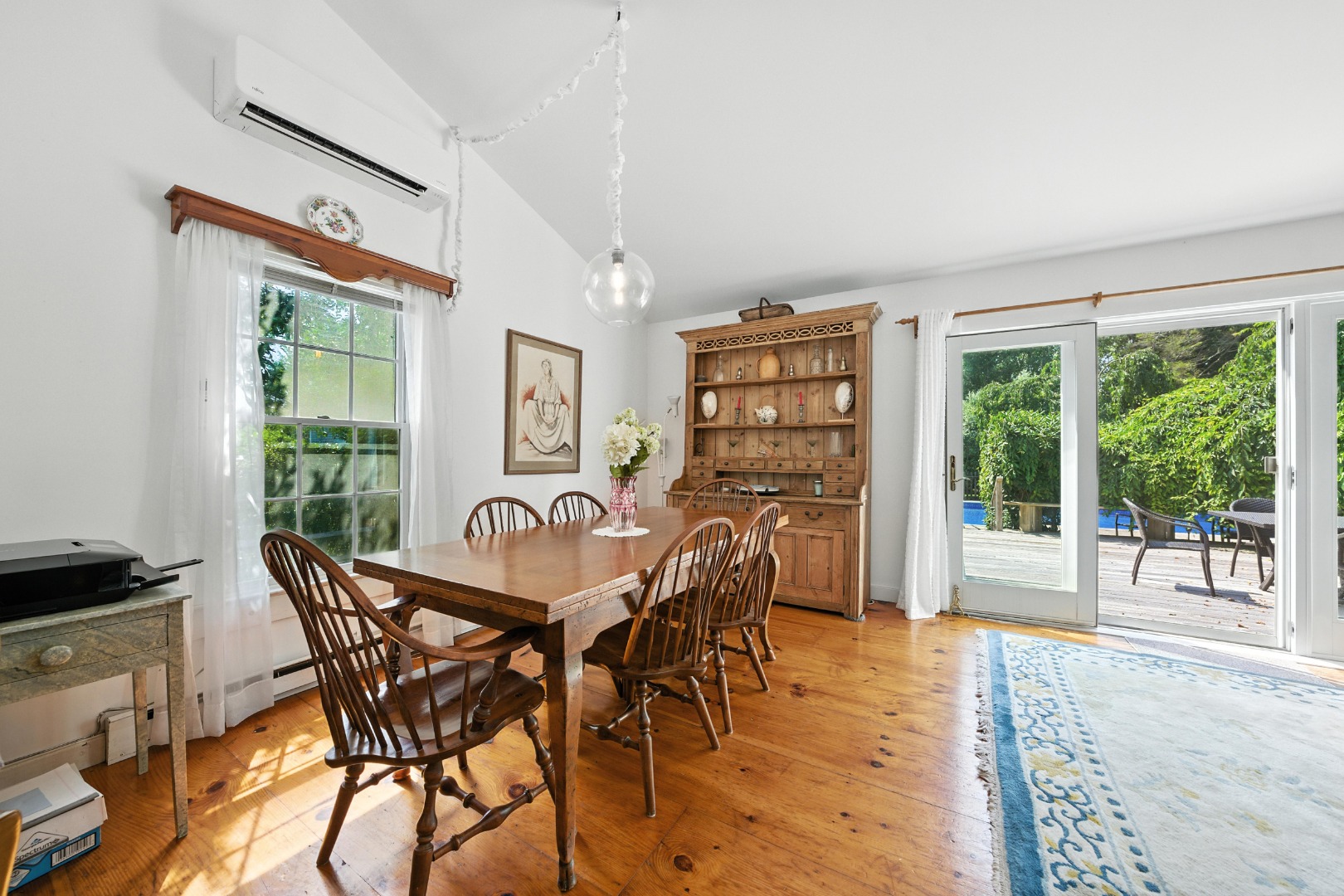 10 Meadow View Drive Nantucket, MA 02554 - Photo 20 of 48 a dining room with furniture and a floor to ceiling window