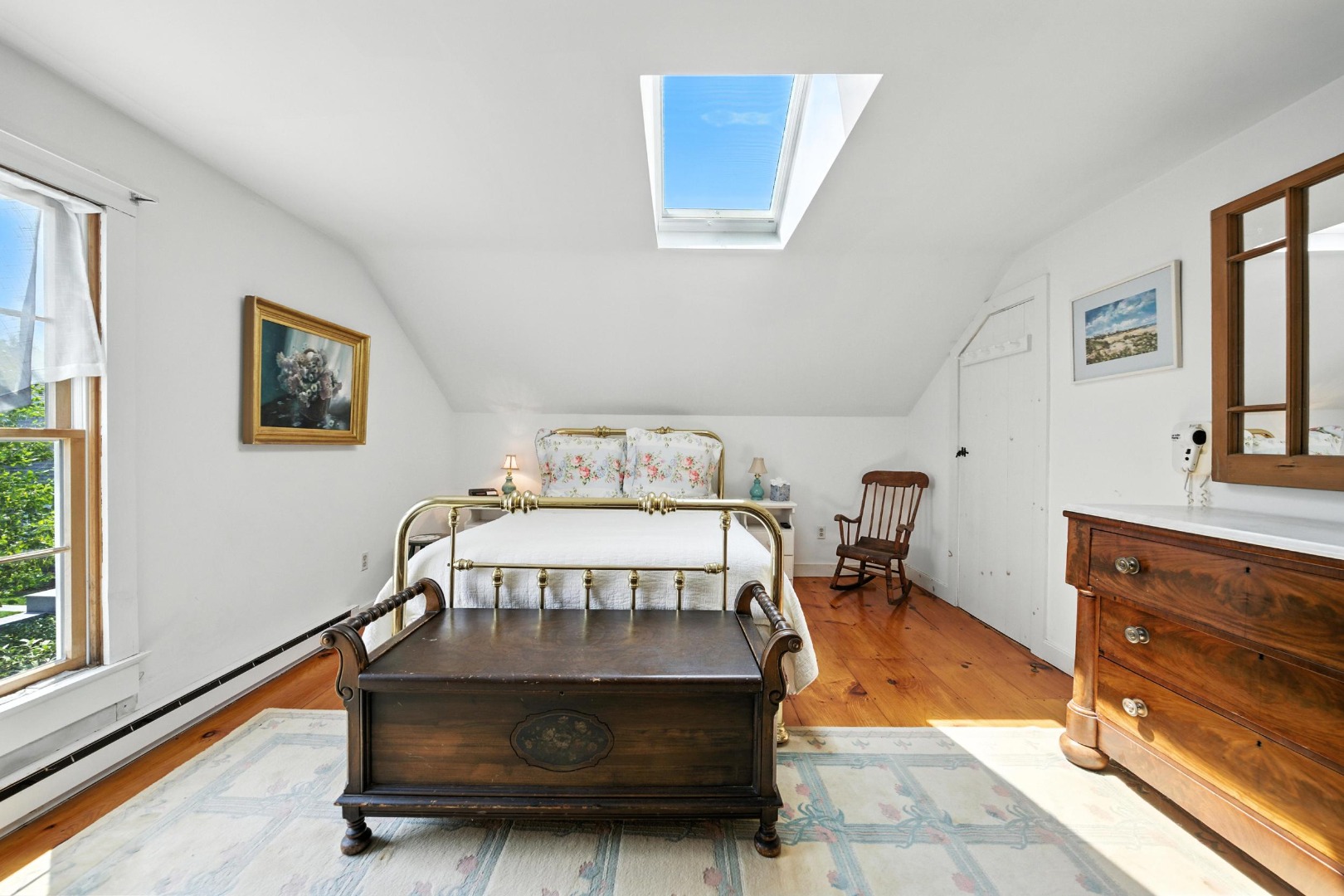 10 Meadow View Drive Nantucket, MA 02554 - Photo 31 of 48 a bedroom with a bed and wooden floor