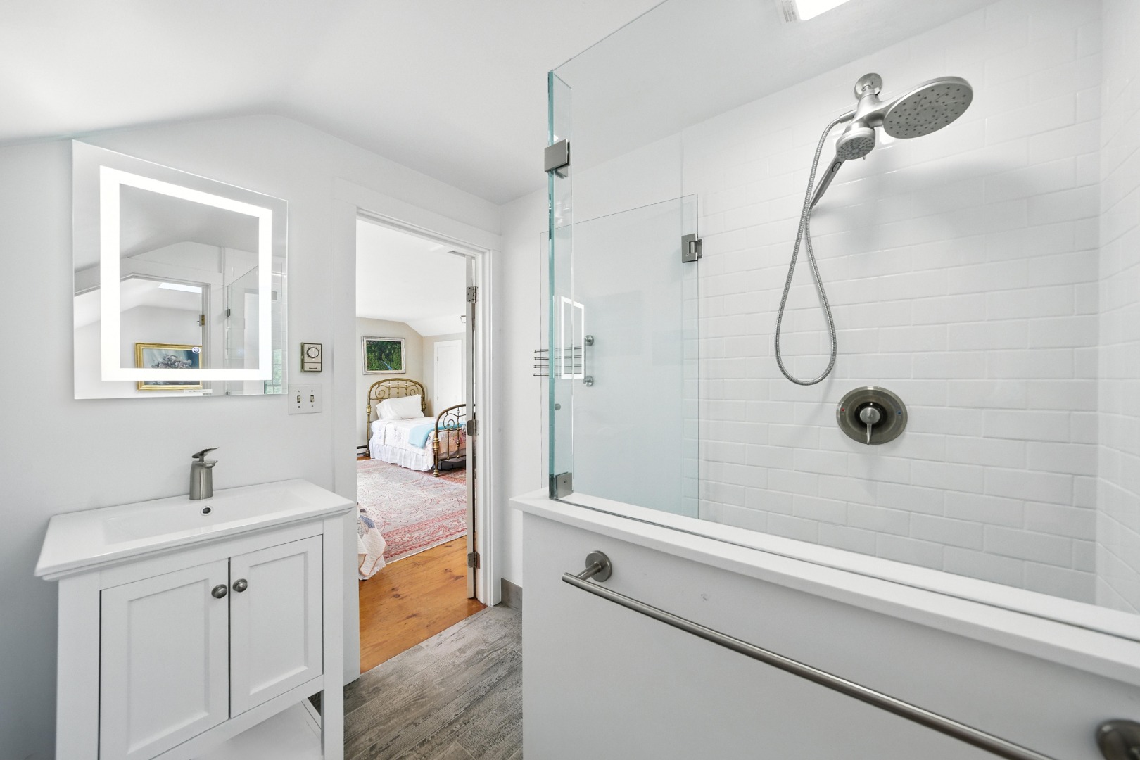 10 Meadow View Drive Nantucket, MA 02554 - Photo 35 of 48 a bathroom with a granite countertop sink a mirror and shower