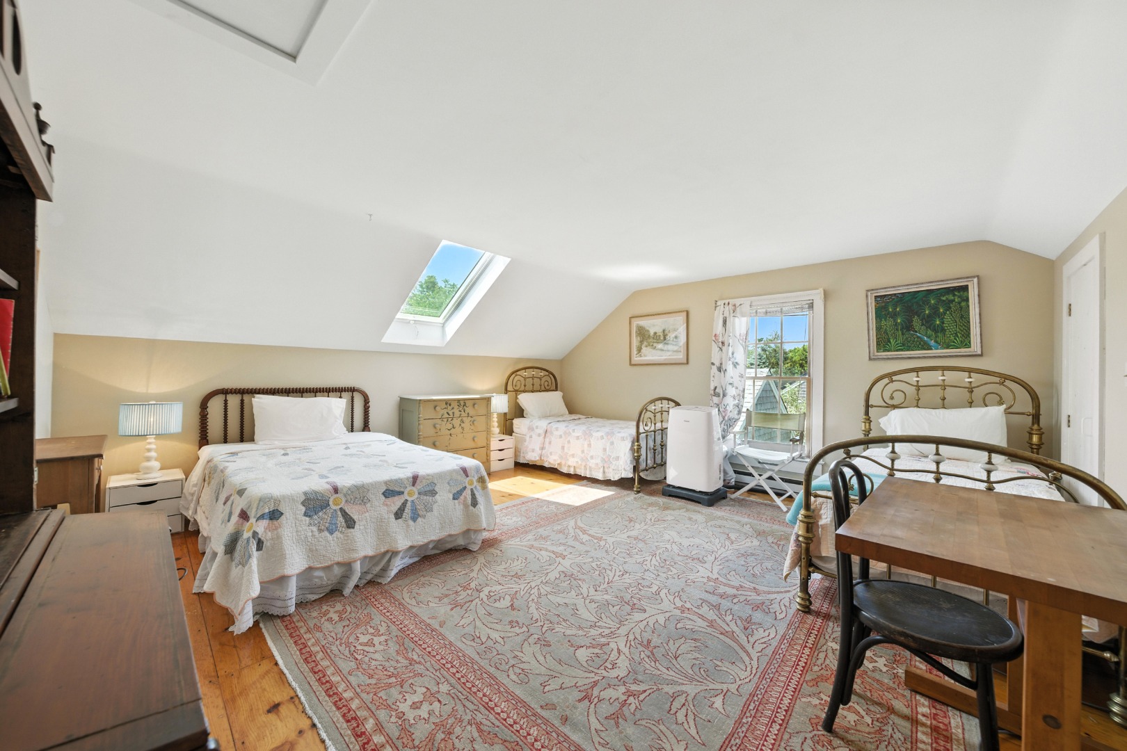 10 Meadow View Drive Nantucket, MA 02554 - Photo 37 of 48 a bedroom with a bed a table and chair