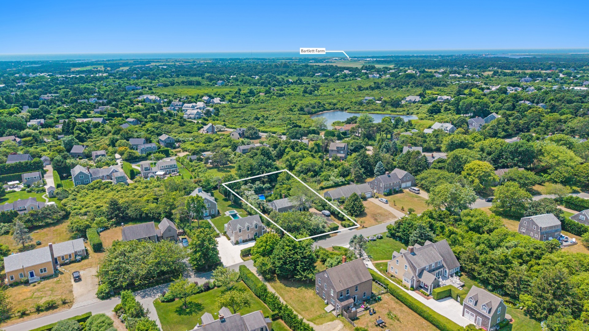 10 Meadow View Drive Nantucket, MA 02554 - Photo 7 of 48 an aerial view of residential houses with outdoor space and trees