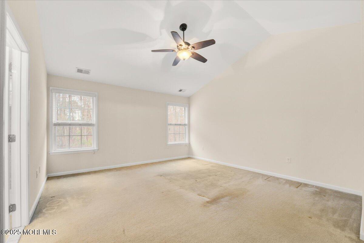 28 Santa Rosa Lane Tinton Falls, NJ 07753 - Photo 17 of 26 wooden floor in an empty room with a window