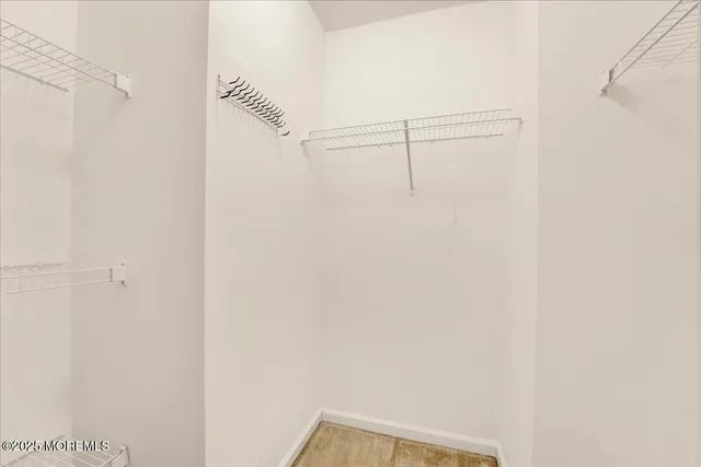 a view of small space with racks on the wall