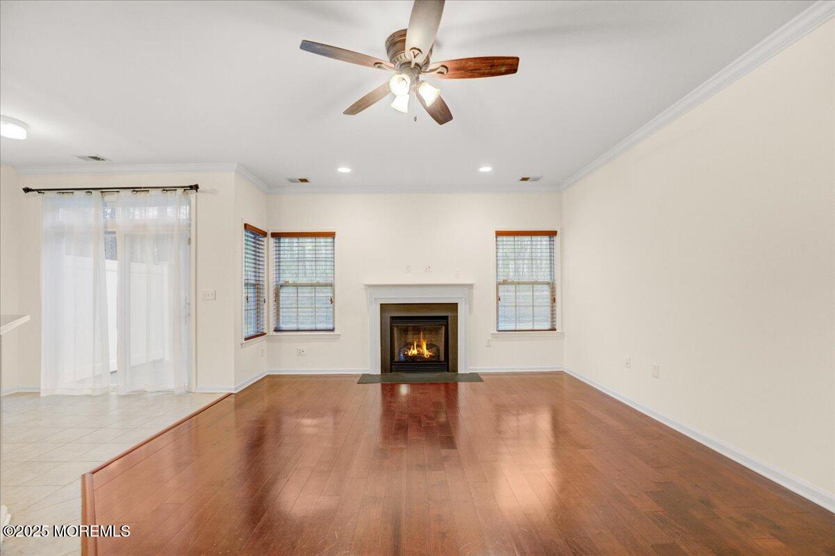28 Santa Rosa Lane Tinton Falls, NJ 07753 - Photo 4 of 26 a view of a livingroom with a fireplace and window