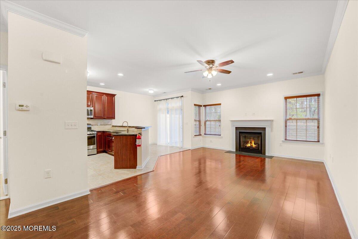 28 Santa Rosa Lane Tinton Falls, NJ 07753 - Photo 10 of 26 a view of kitchen with microwave a stove and a refrigerator