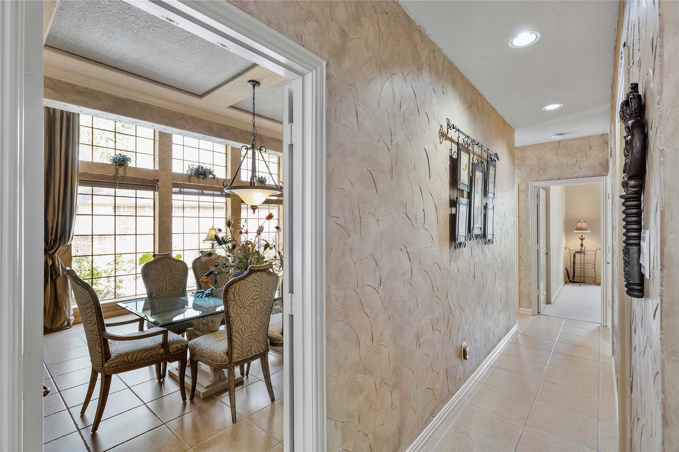 7 North Spring Brook Court Spring, TX 77382 - Photo 24 of 49 You also have access to the dining room right off the kitchen - convenience for hosting, while also having a dedicated space!