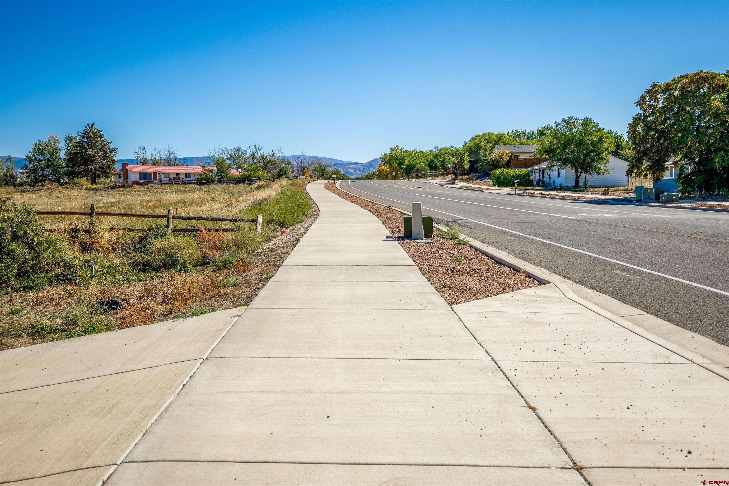 Tbd Lot 1 East Oak Grove Road Montrose, CO 81401 - Photo 6 of 11 a view of swimming pool with outdoor space and trees in the background