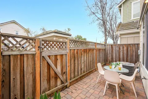 a view of a chairs on the roof deck