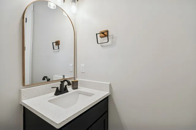 a bedroom with a bed and a walk in closet