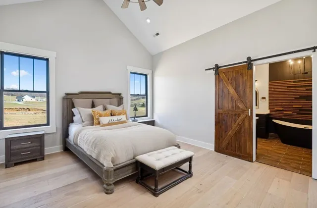 a bathroom with a sink double vanity and a mirror