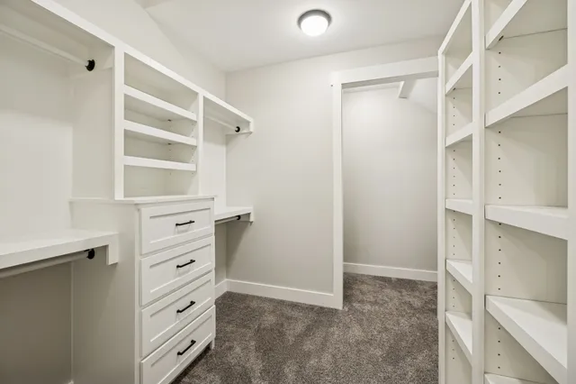 a view of room with furniture and a window