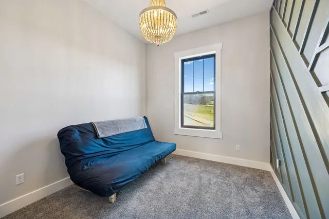 a view of entryway with chandelier