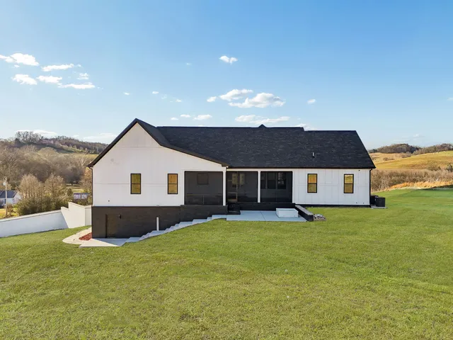 a view of a lake with a yard