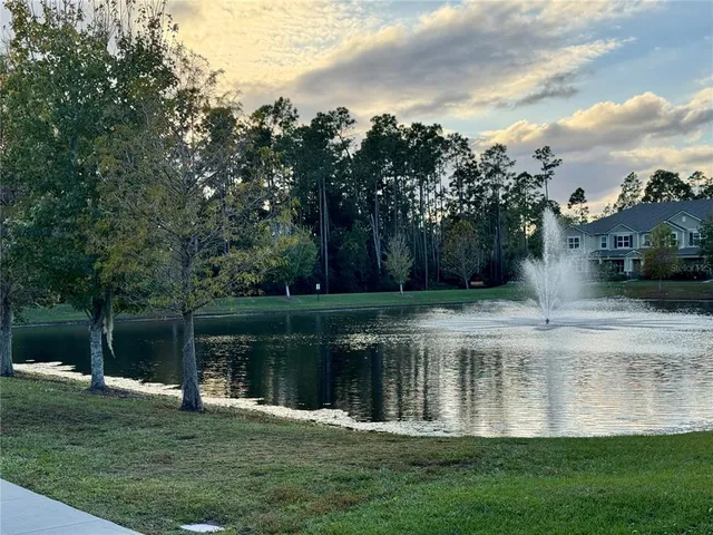 a swimming pool with lake view