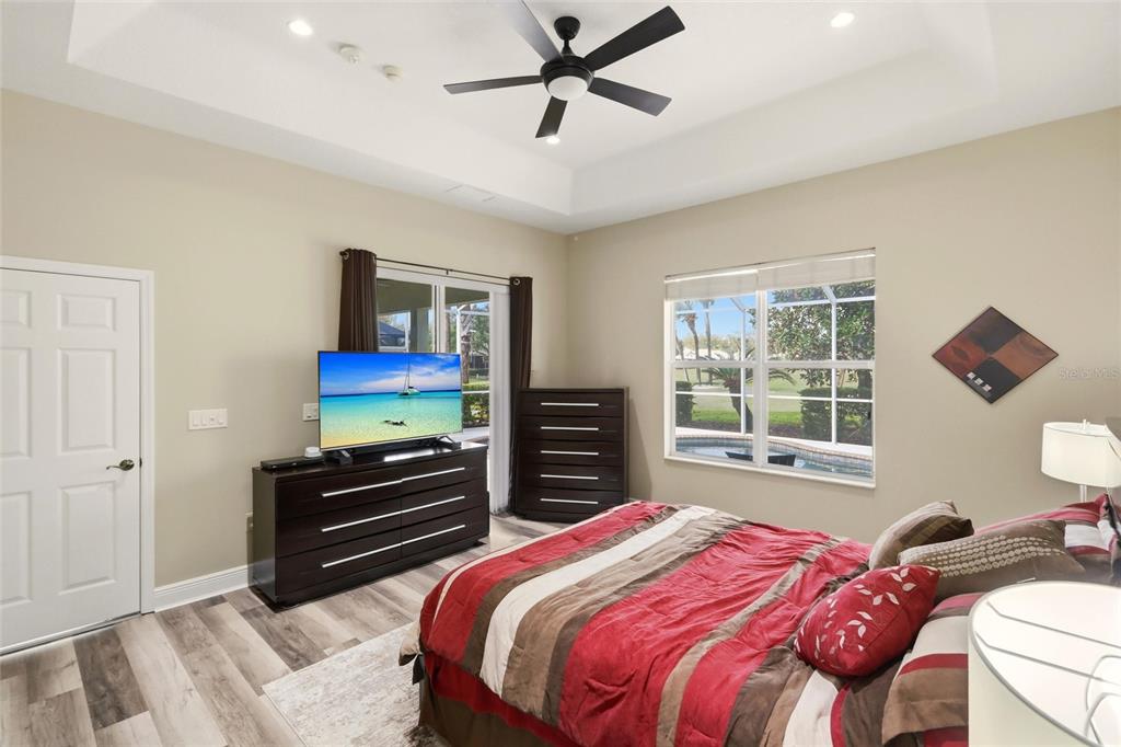 508 Fallbrook Drive Venice, FL 34292 - Photo 12 of 20 a bedroom with a bed and a television