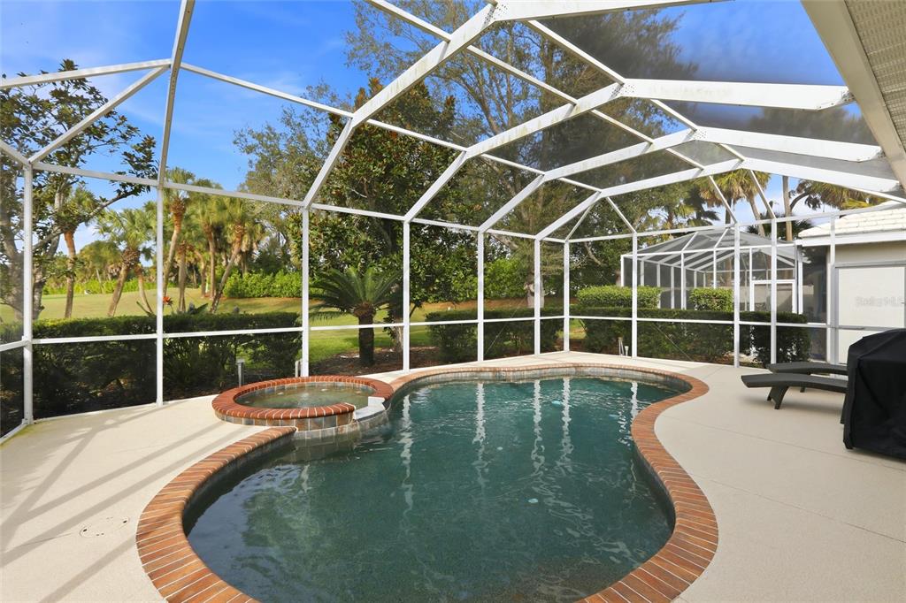 508 Fallbrook Drive Venice, FL 34292 - Photo 17 of 20 a view of a swimming pool with seating area