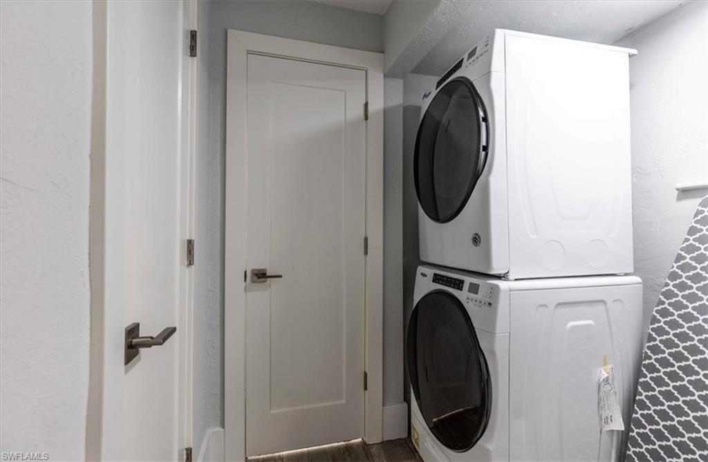 3240 Collee Court Naples, FL 34112 - Photo 25 of 42 a utility room with dryer and washer