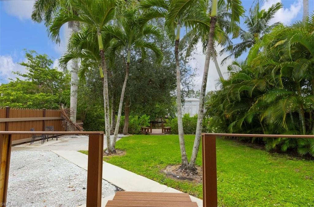 3240 Collee Court Naples, FL 34112 - Photo 28 of 42 a view of backyard with green space