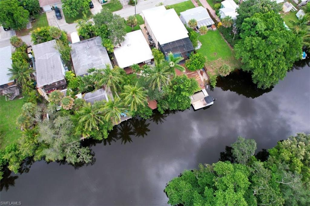 3240 Collee Court Naples, FL 34112 - Photo 37 of 42 an aerial view of a house with a yard and garden