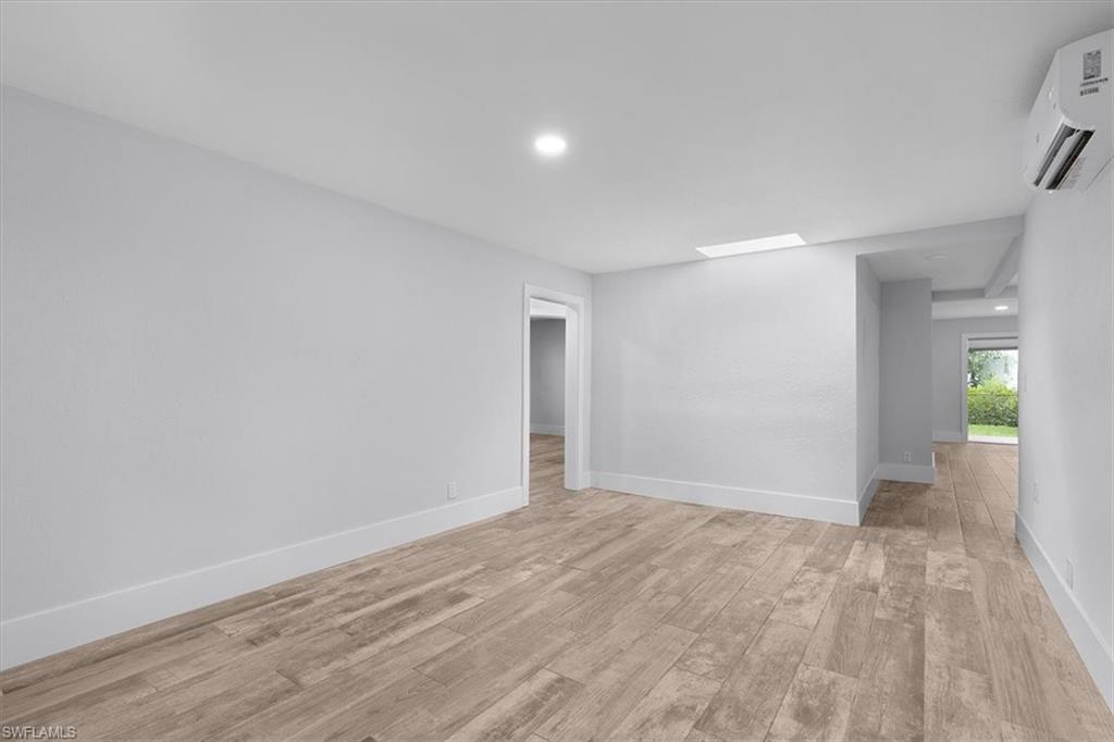 3240 Collee Court Naples, FL 34112 - Photo 7 of 42 a view of an empty room and window