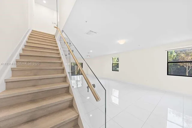 a view of a livingroom with an entryway
