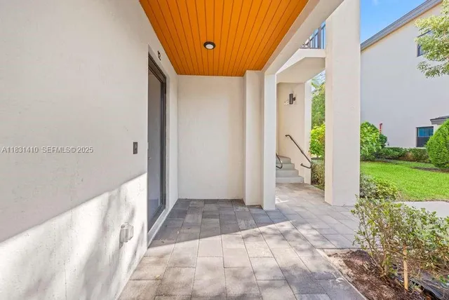 a balcony view with a garden space
