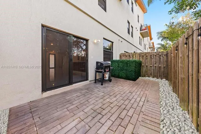 a view of a garden with a fountain
