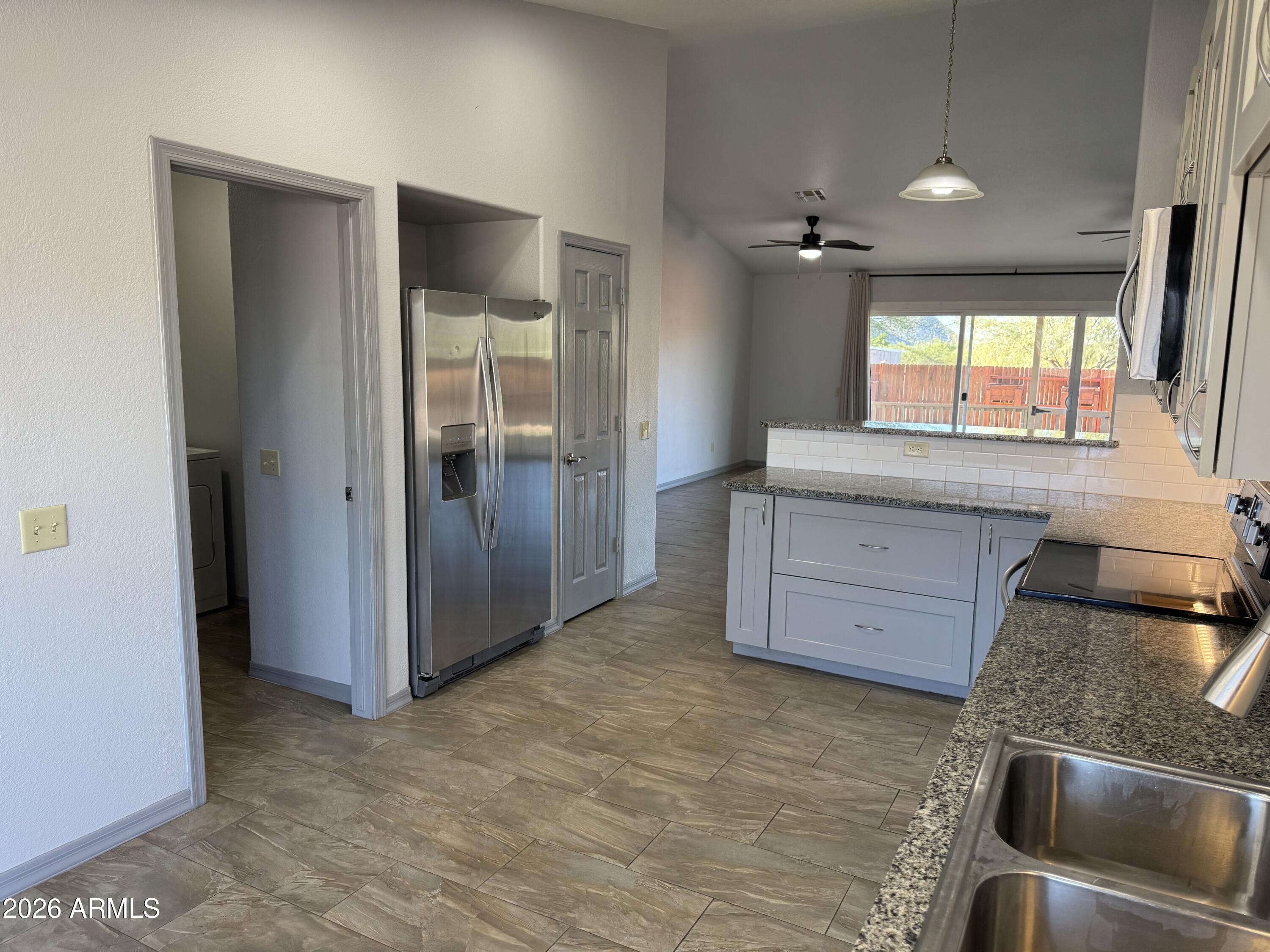 2707 West Irvine Road Phoenix, AZ 85086 - Photo 23 of 40 KitchentoGreatroom_Irvine