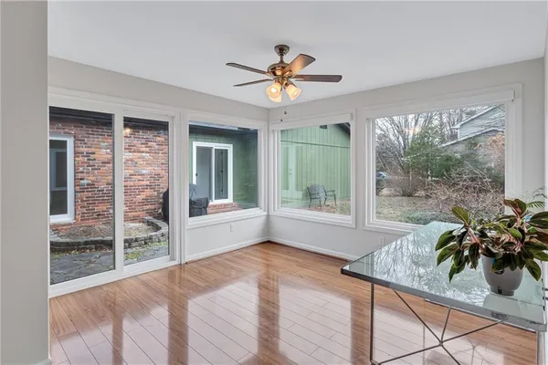 a view of a livingroom with a potted plant