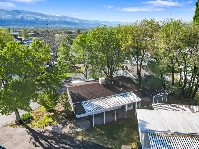 96 Barrington Way Layton, UT 84041 - Photo 19 of 28 Aerial view of a mountainous background