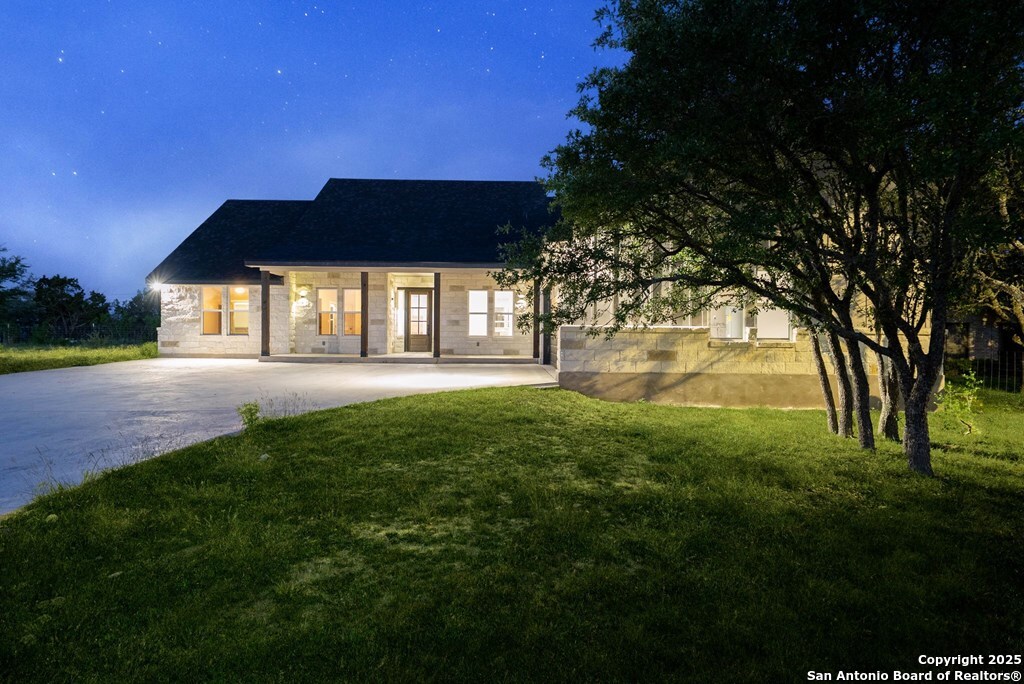 502 Sumack Kerrville, TX 78028 - Photo 54 of 58 a front view of a house with a yard