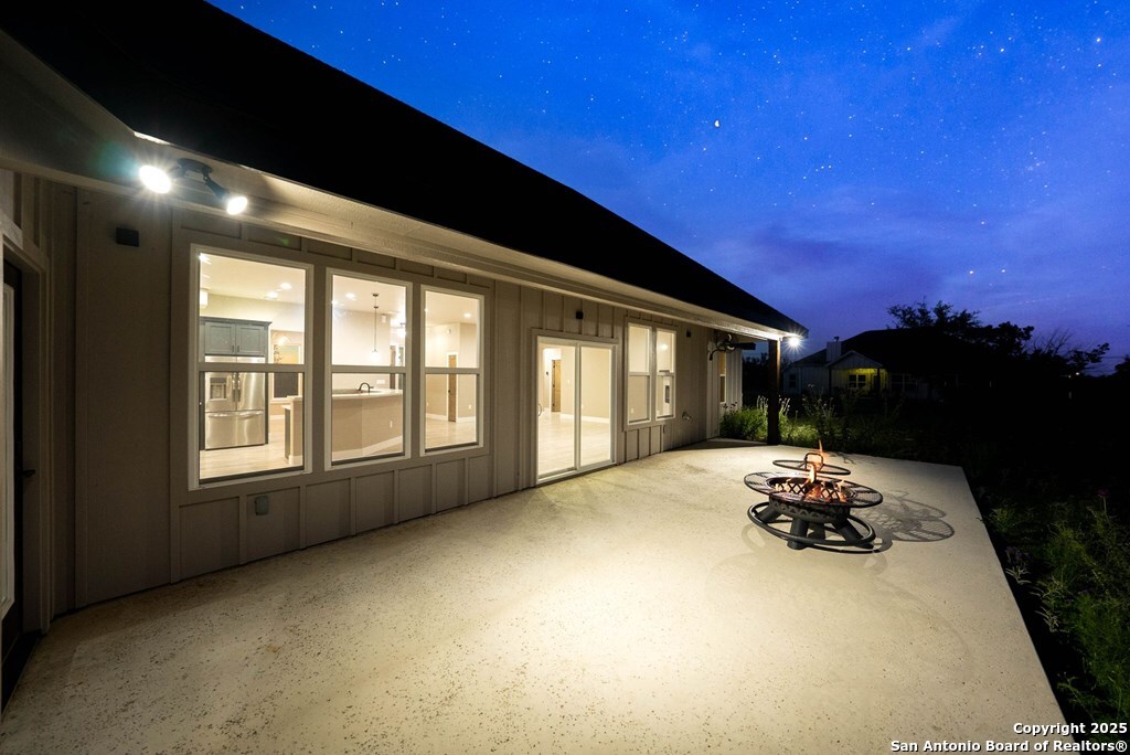 502 Sumack Kerrville, TX 78028 - Photo 56 of 58 a bed sitting in a room next to a window