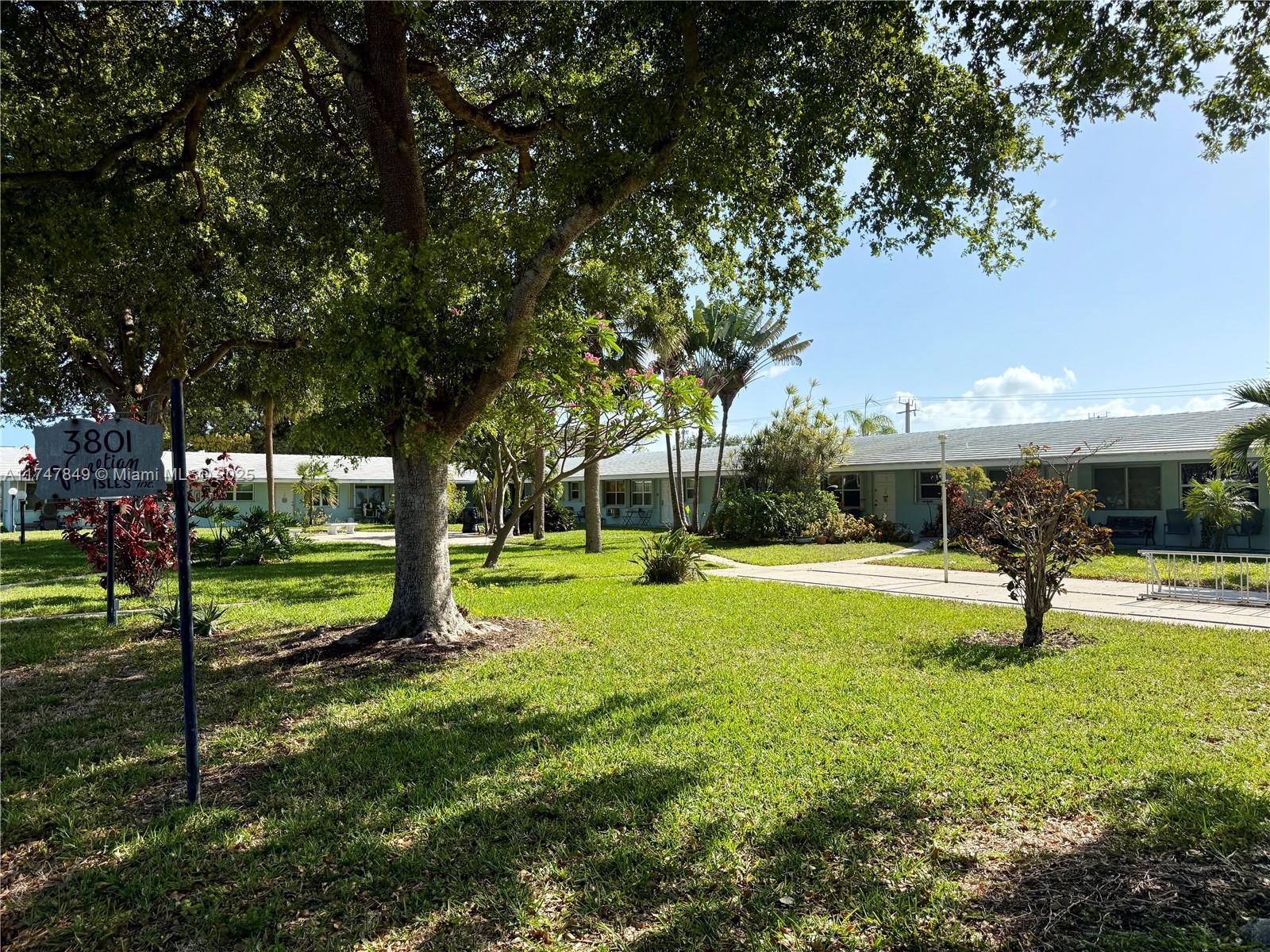 a view of a backyard with green space