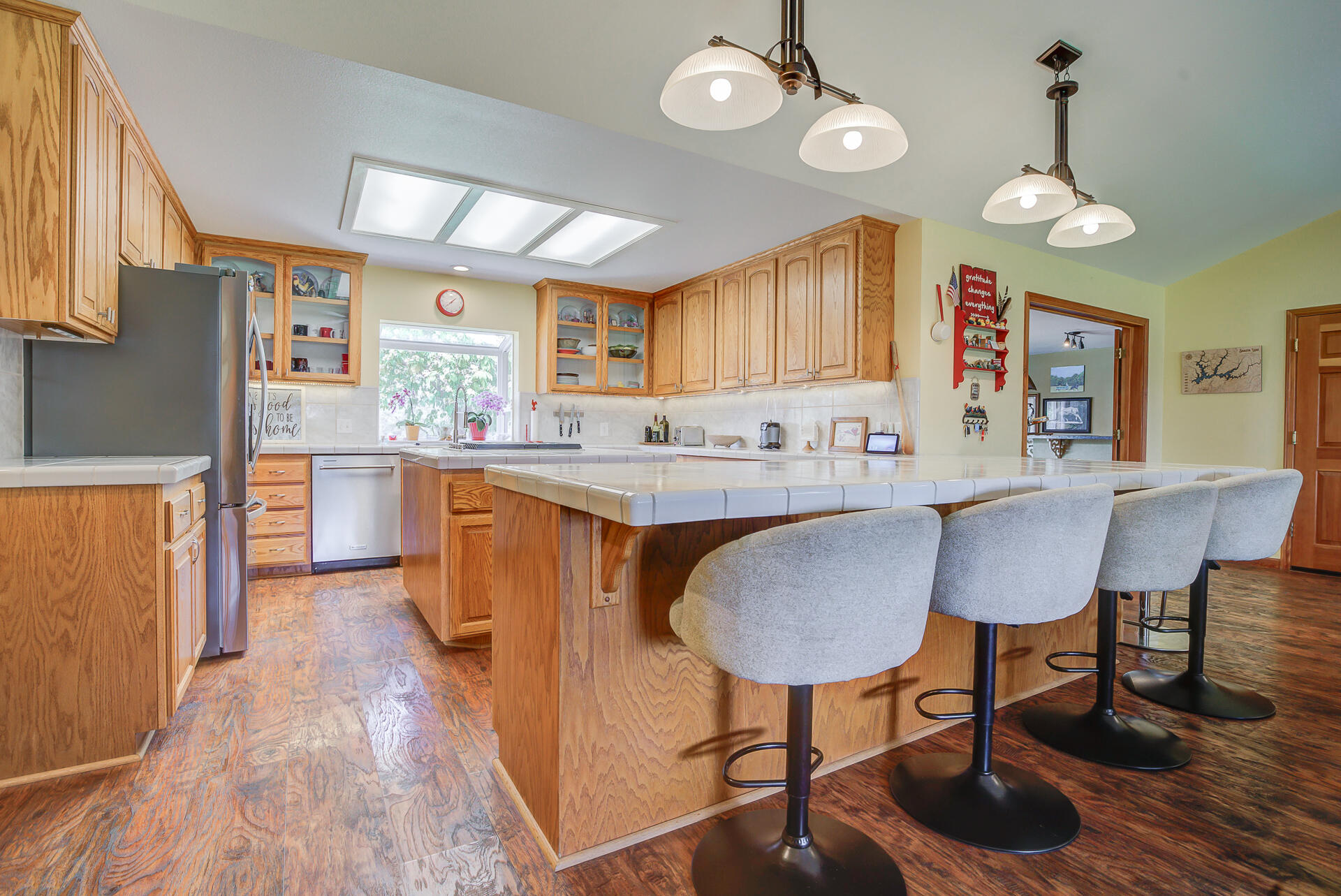 17536 Oly Way Anderson, CA 96007 - Photo 12 of 51 a view of a dining room with furniture window and wooden floor
