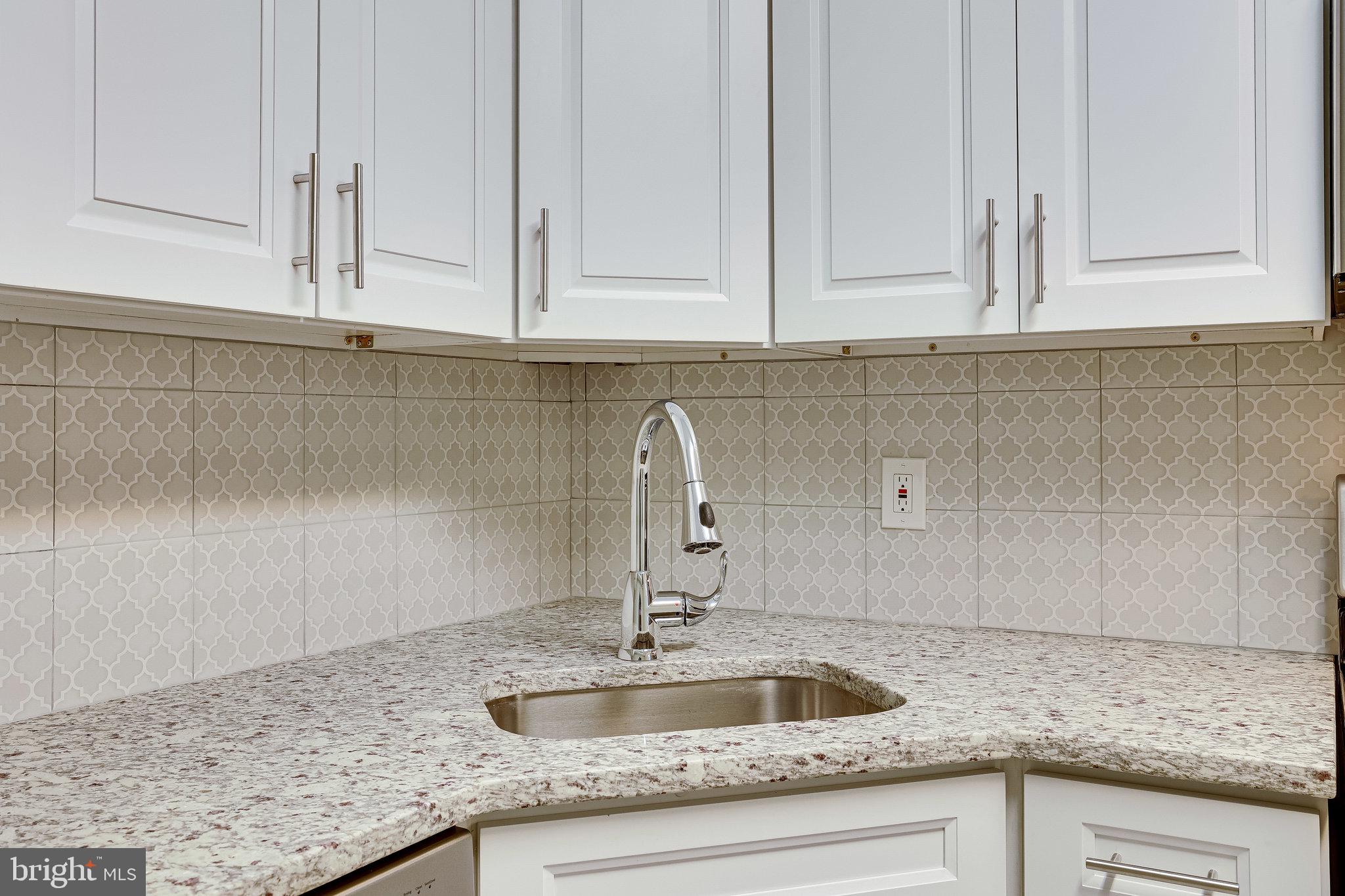 2210 Springwood Drive, Unit 207 Reston, VA 20191 - Photo 14 of 28 42" white shaker cabinets