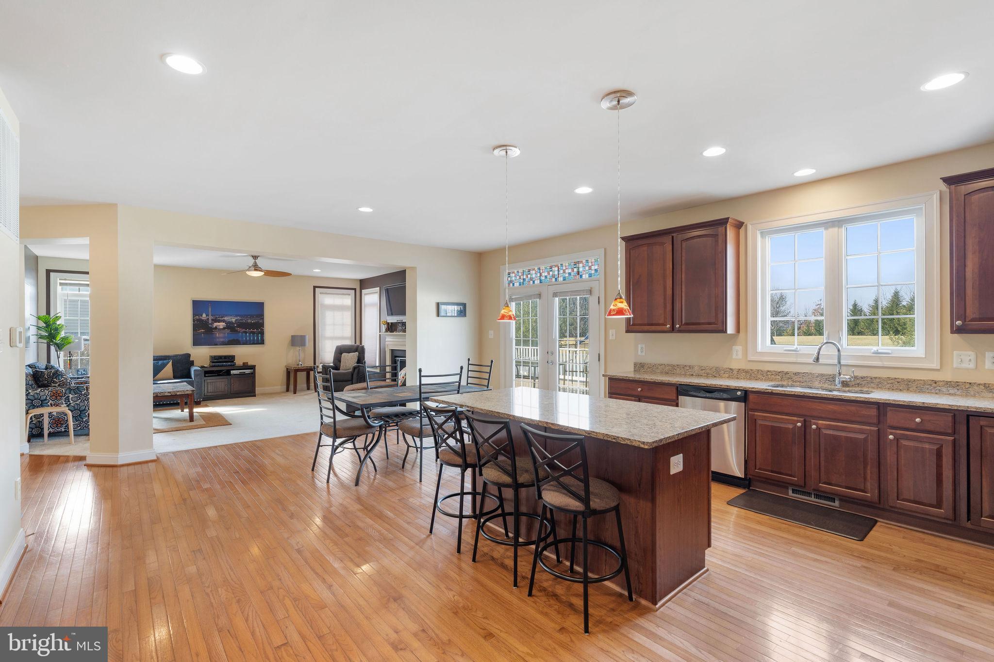 5102 Hugunin Way Perry Hall, MD 21128 - Photo 16 of 45 a large kitchen with lots of counter space and furniture