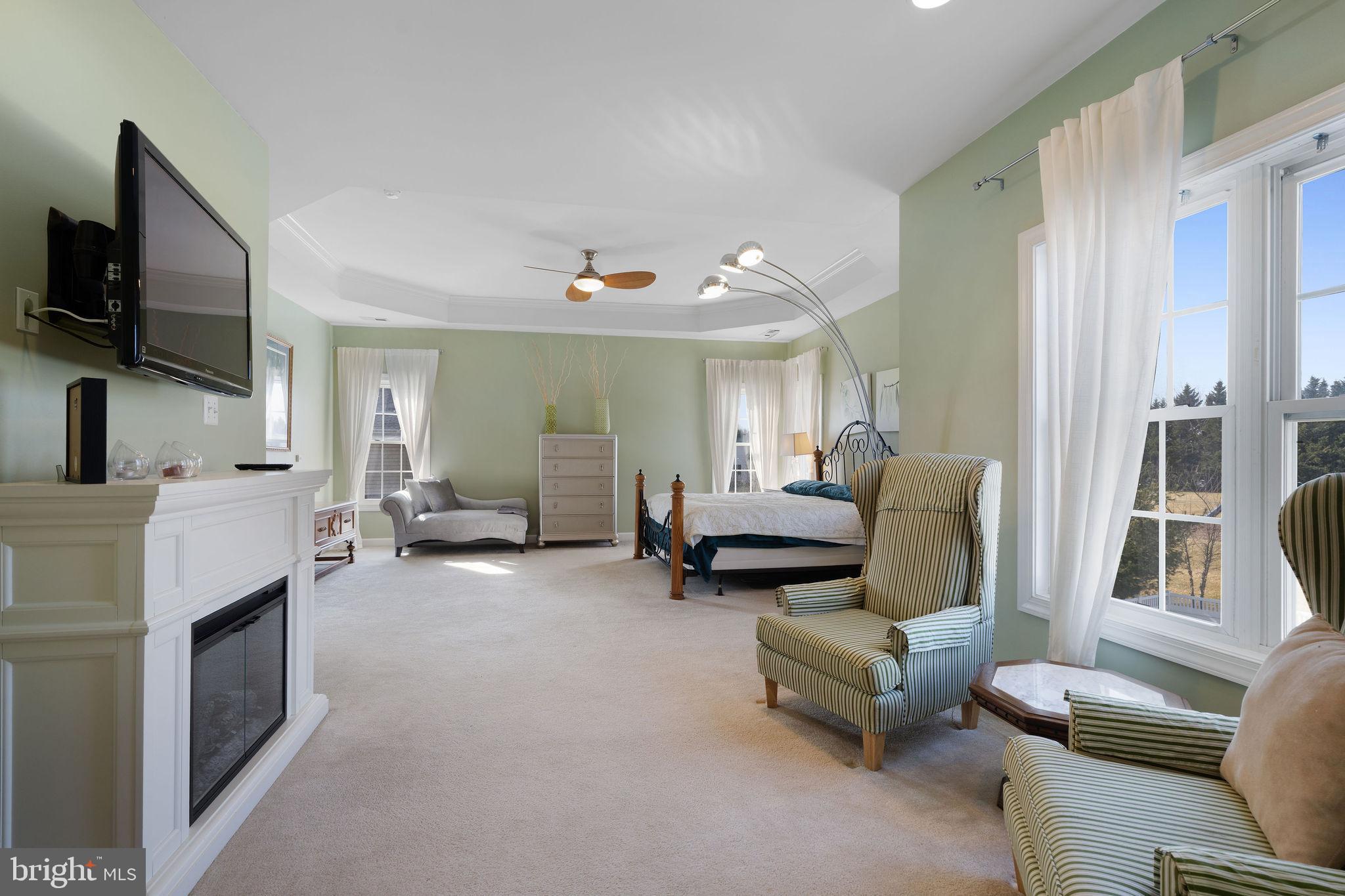 5102 Hugunin Way Perry Hall, MD 21128 - Photo 23 of 45 a living room with furniture and a flat screen tv