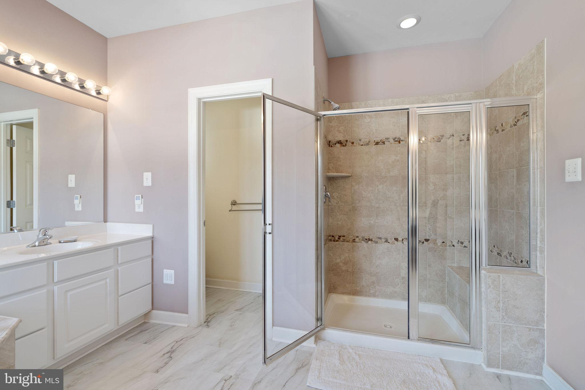5102 Hugunin Way Perry Hall, MD 21128 - Photo 25 of 45 a bathroom with a shower and a sink