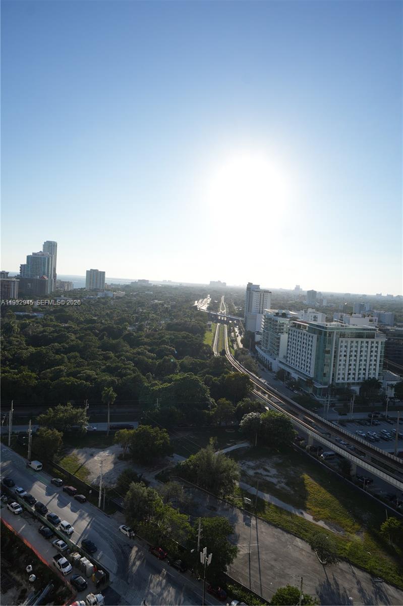 60 Southwest 13th Street, Unit 1901 Miami, FL 33130 - Photo 17 of 17 a view of a back yard of the house