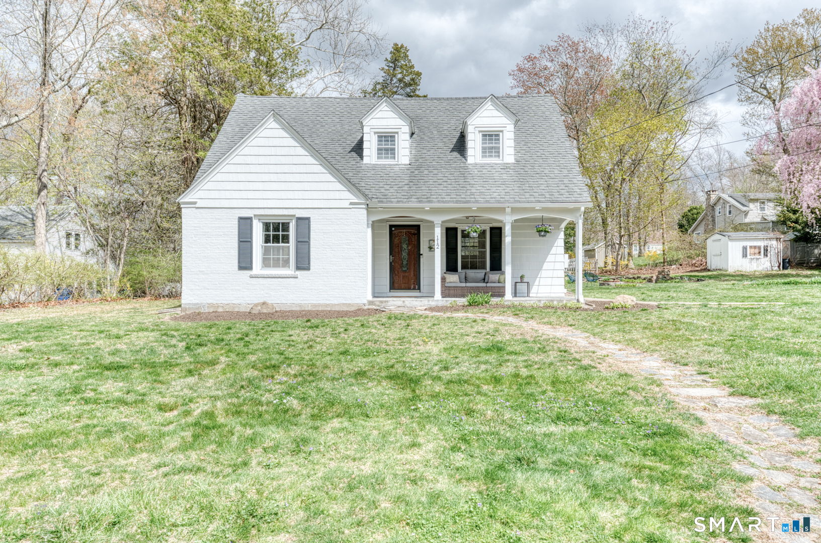 112 Fitzgerald Boulevard Coventry, CT 06238 - Photo 1 of 25 a front view of a house with a yard