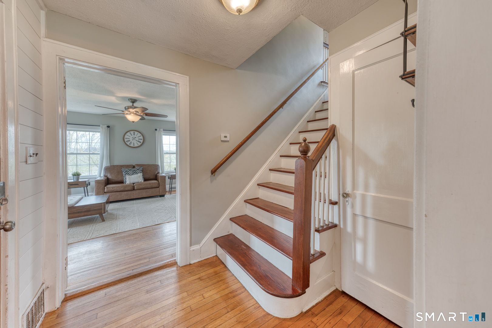 112 Fitzgerald Boulevard Coventry, CT 06238 - Photo 14 of 25 a view of entryway and hall with wooden floor