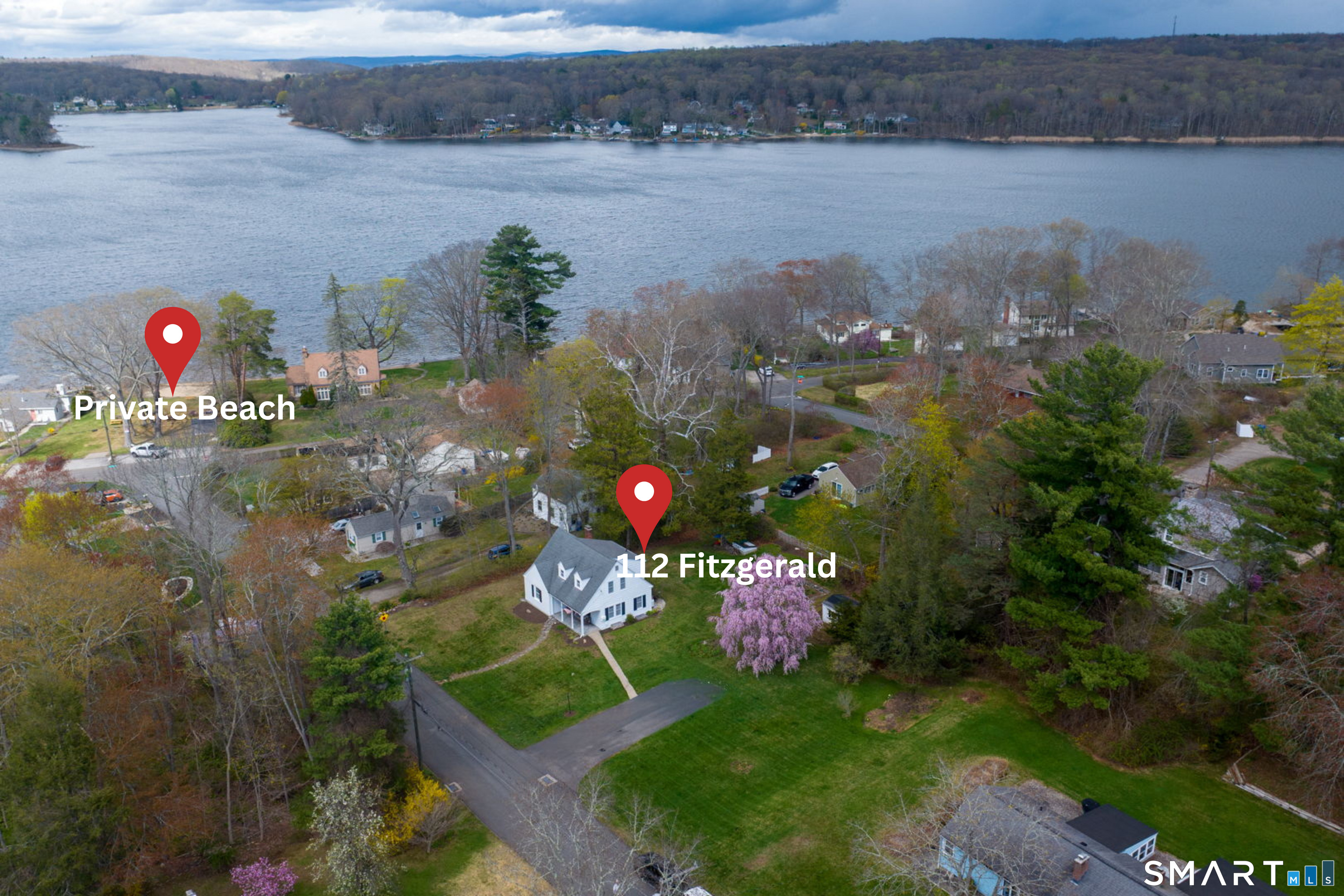 112 Fitzgerald Boulevard Coventry, CT 06238 - Photo 22 of 25 a view of a lake from a yard