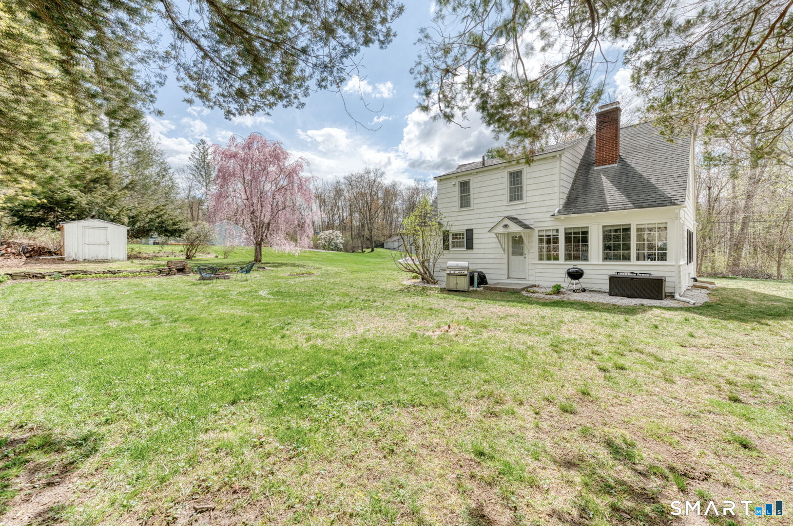 112 Fitzgerald Boulevard Coventry, CT 06238 - Photo 4 of 25 a view of a house with a big yard