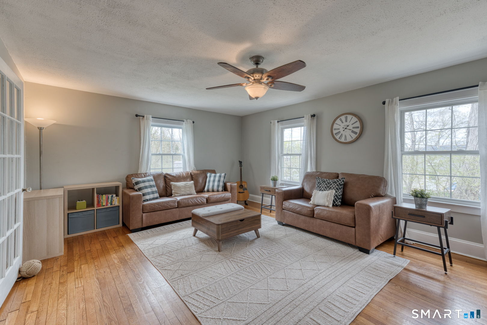 112 Fitzgerald Boulevard Coventry, CT 06238 - Photo 8 of 25 a living room with furniture and a large window